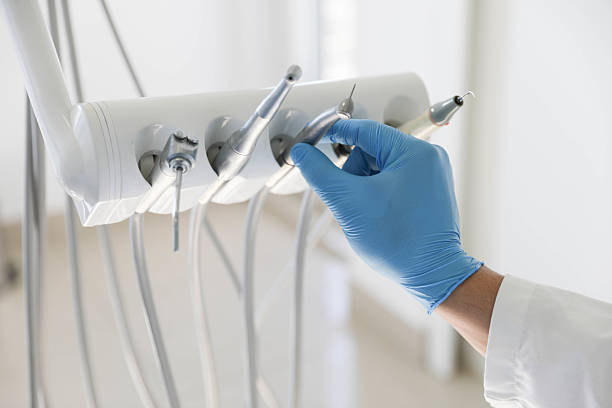 Professional Tooth Extraction technician working in La Mesilla, NM